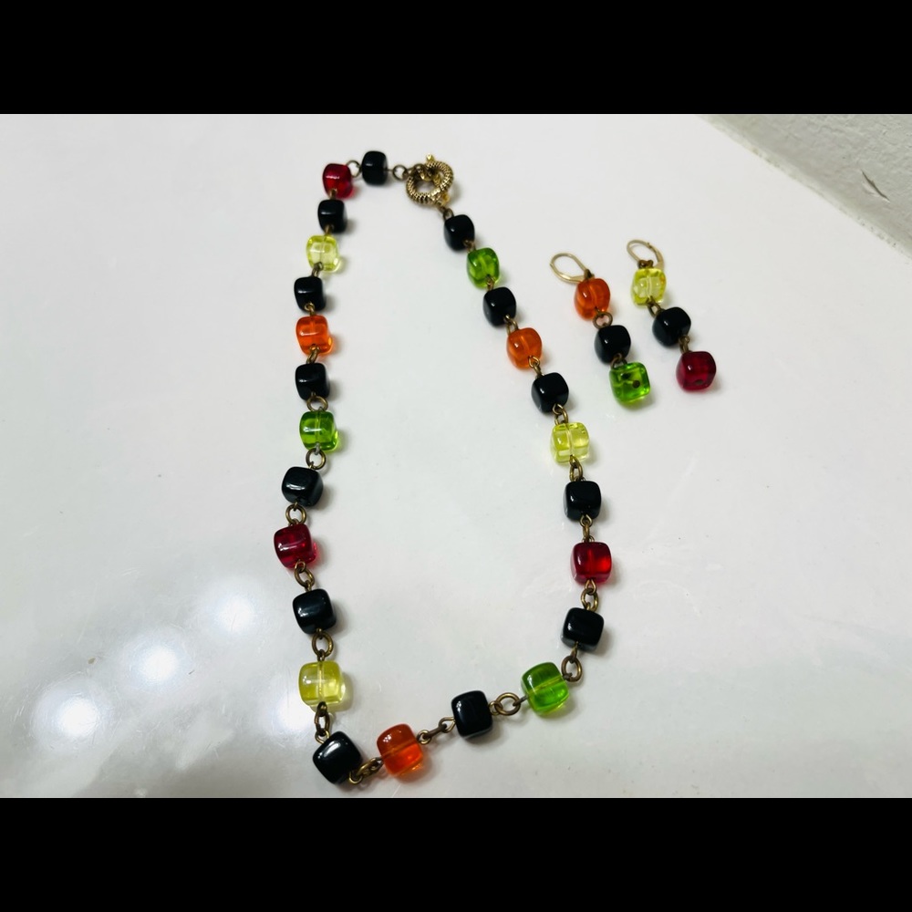 Handcrafted beaded necklace and earrings.